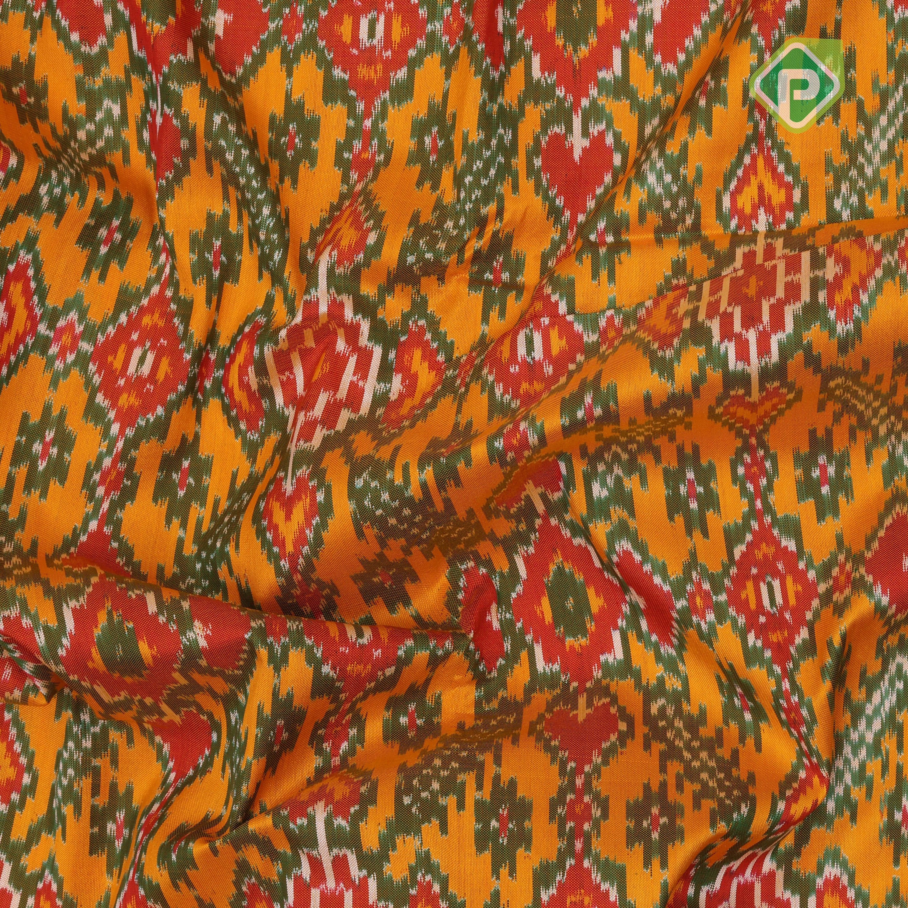 yellow base multi color ikkat design contrast green gold zari diamond border ikkat silk saree