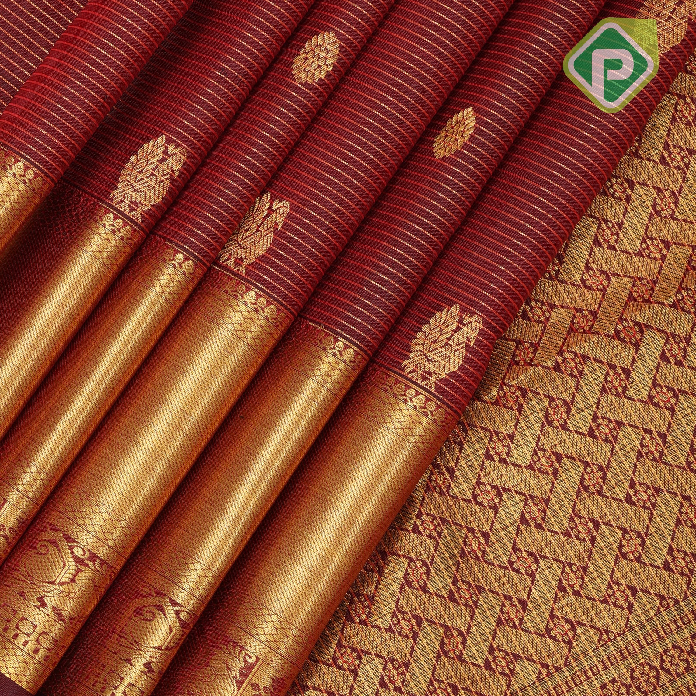 maroon red gold zari lines peacock rudraksham butta self gold zari bavanji border traditional silk saree