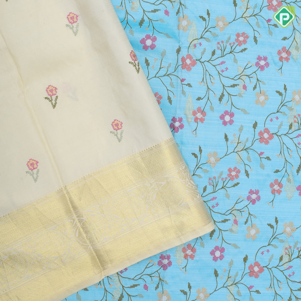 Sky blue multi color floral creeper embroidered design sandal gold zari Rangoli mid retta pattai border embroidery silk saree