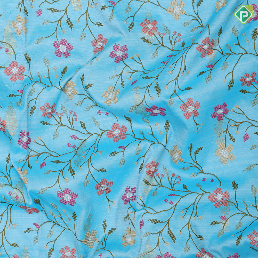 Sky blue multi color floral creeper embroidered design sandal gold zari Rangoli mid retta pattai border embroidery silk saree