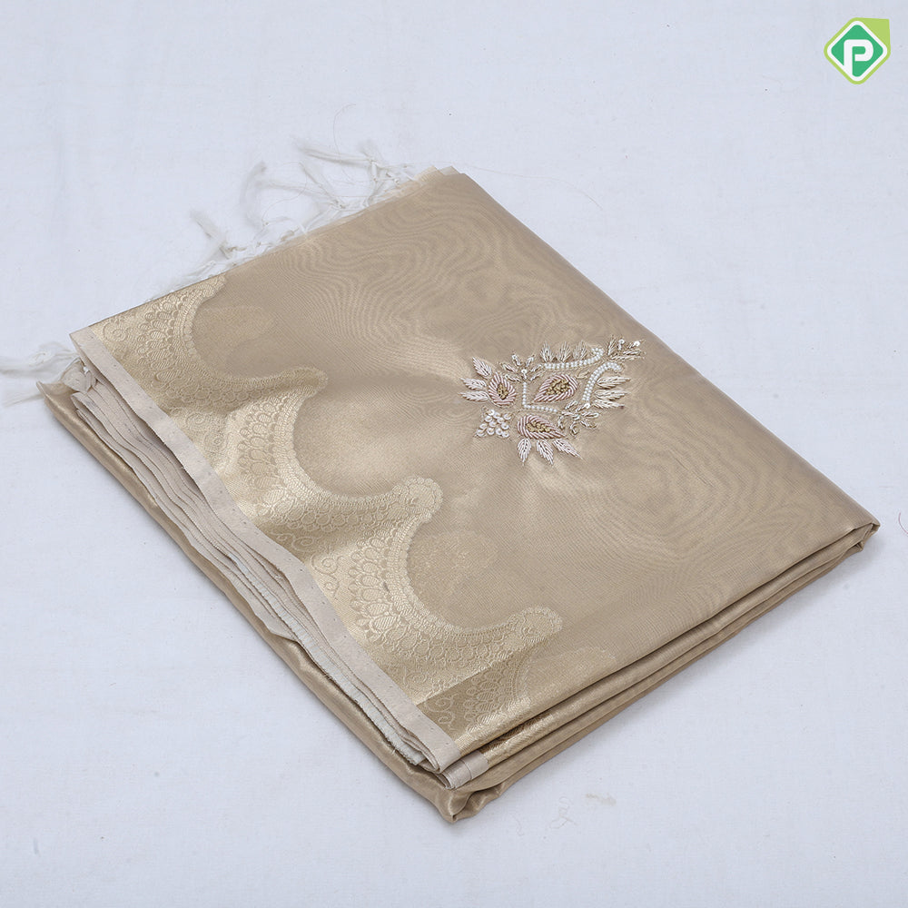Pastel shade tissue Aari work flower design self gold zari cut border trending fancy tissue saree