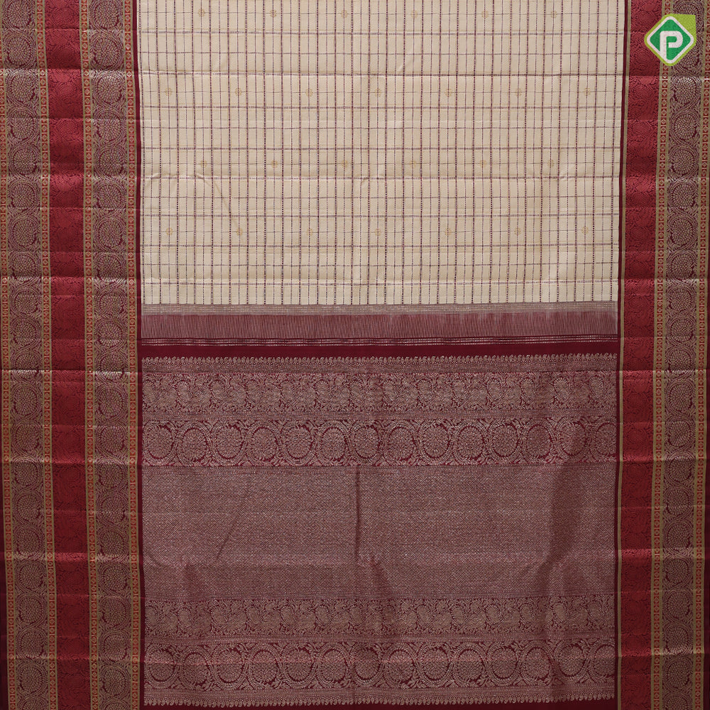 creamy sandal base maroon thread gold zari checks and butta maroon meena work border vintage traditional silk saree