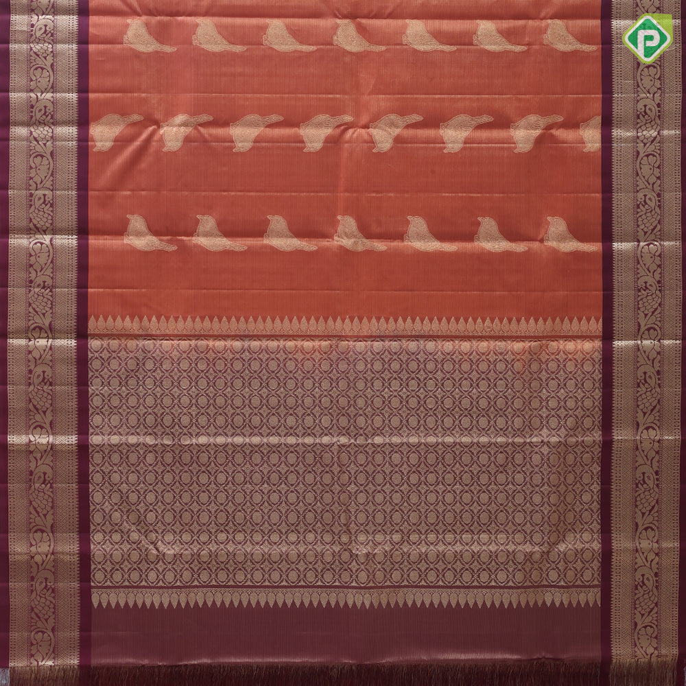 Rust orange tissue weave sparrow butta design contrast maroon gold zari rangoli mid border traditional silk saree