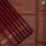 Maroon red gold zari vairaoosi mid butta motifs self gold zari peacock butta and multi color lines border traditional silk saree