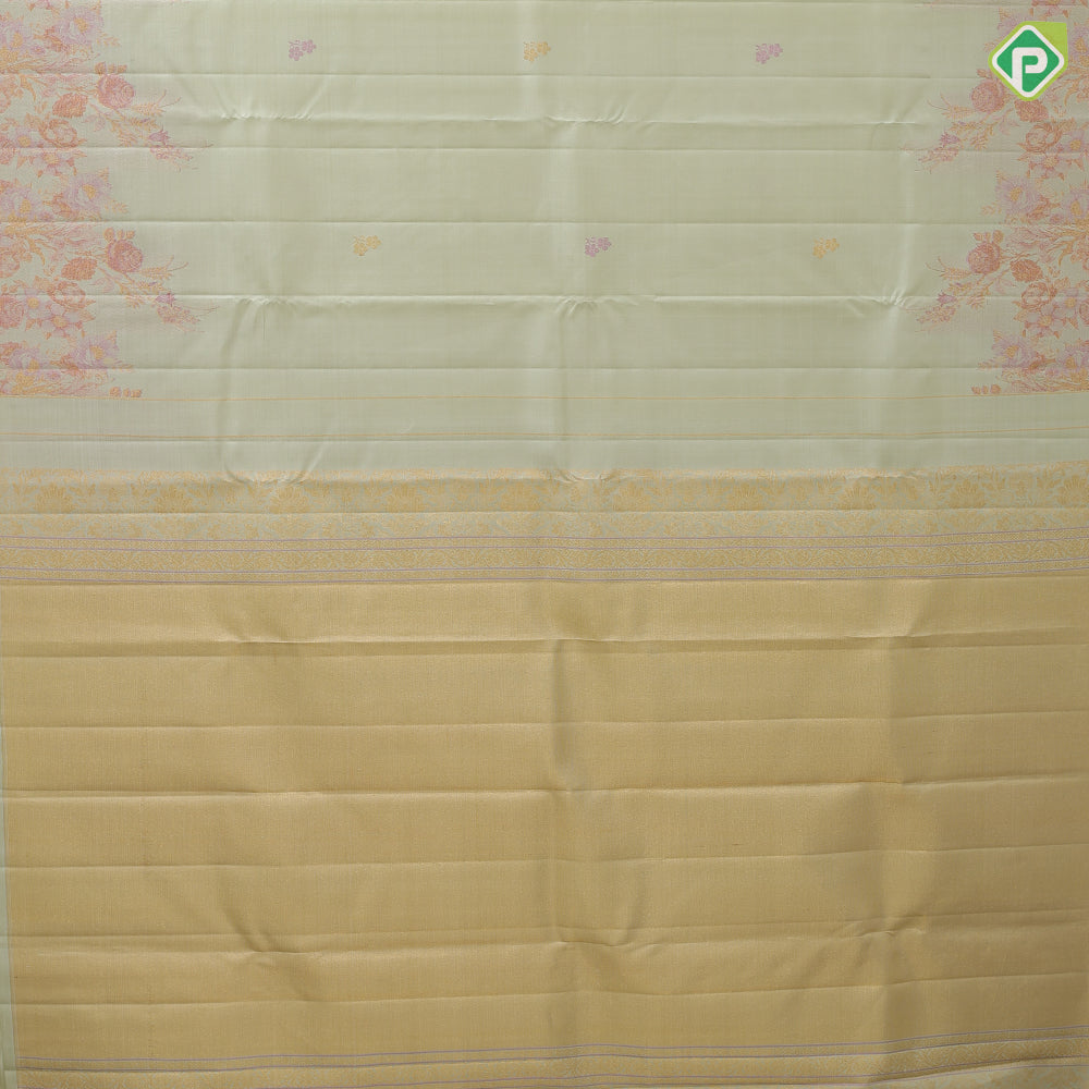 Pista green rose gold neem zari fancy flower butta motifs self tuning floral border trendy designer silk saree