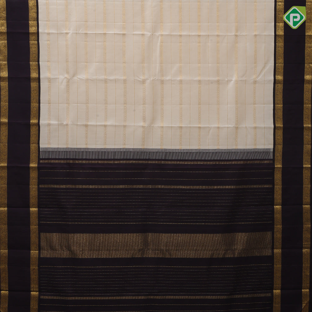 Milk white gold zari velthari design coffee brown peacock floral border design traditional silk saree