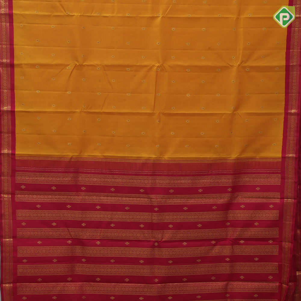Mustard yellow chakaram design maroon flower border design traditional silk saree