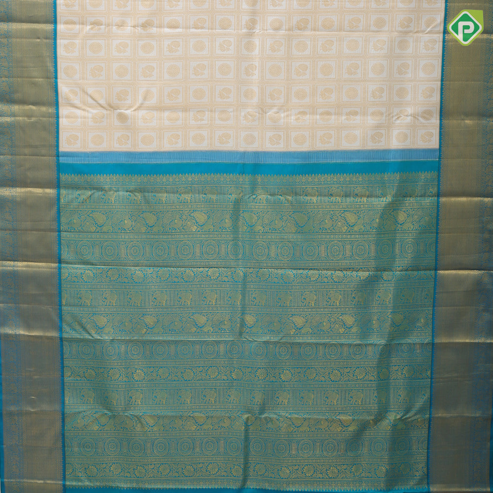 White gold zari annam chakkaram butta checks design peacock green gold zari zig zag stripes border bridal silk saree