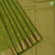 Parrot green gold zari lines and fancy butta self gold zari edge border pure mix silk saree