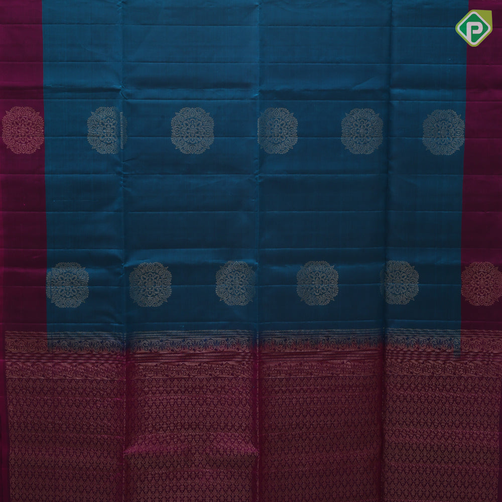 Peacock blue gold zari round rangoli butta motifs Purple Plain border grand pallu soft silk saree