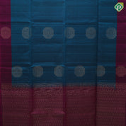 Peacock blue gold zari round rangoli butta motifs Purple Plain border grand pallu soft silk saree