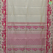 Mint green silver gold zari geometrical brocade design contrast rani pink gold zari wild effect pythonic design border grand tissue silk saree