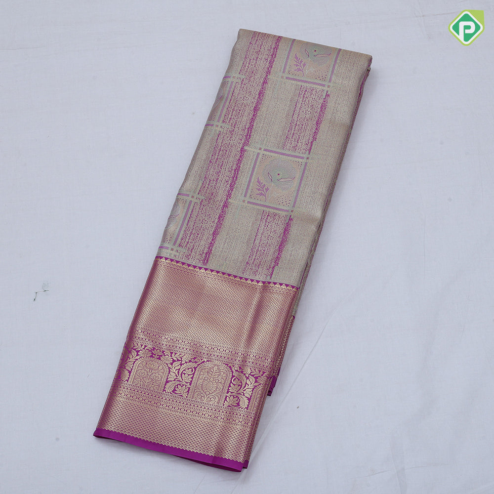 green base pastel red frame flower design self color gold zari grand border tissue art silk saree