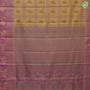golden yellow with light pink flower bunch in frame design pink gold zari elephant and floral butta border tissue silk saree