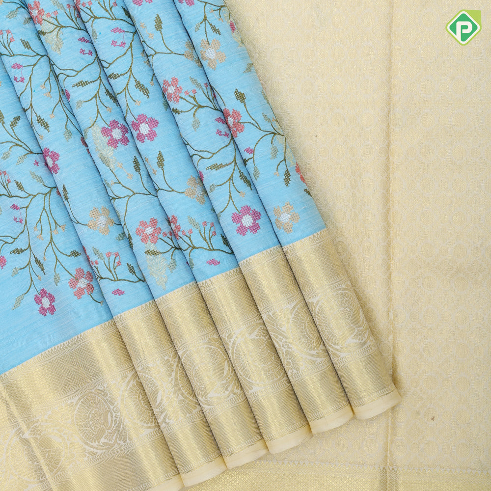 Sky blue multi color floral creeper embroidered design sandal gold zari Rangoli mid retta pattai border embroidery silk saree