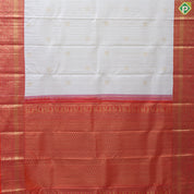 White gold zari checked window panel peacock chakkaram design pinkish orange gold zari border traditional silk saree