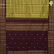 Mustard green gold zari rangoli lines design contrast syrup brown gold zari mango rangoli butta border traditional vintage silk saree