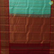 Pista green gold zari thousand butta design rani red gold zari floral border traditional silk saree