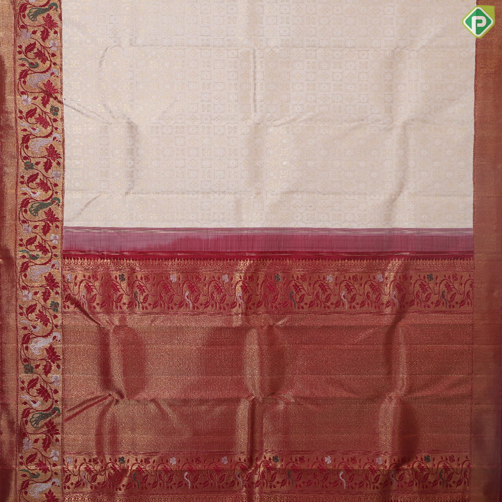 Creamy Sandal With Green Colour Pythonic Design Border Grand Bridal Silk Saree