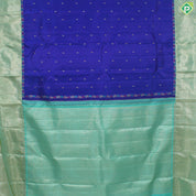 Ink Blue Gold Zari Small Motif With Olive Green Gold And Silver Zari Tissue Border Trendy Silk Saree