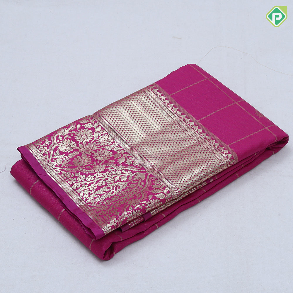 Rani pink gold zari double peacock deer round butta self gold zari flower and diamond border art silk saree