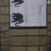 Ash Grey Big Elephant ikkat Design Contrast Black Gold Zari Peacock and mango multi lines border Ikkat silk saree