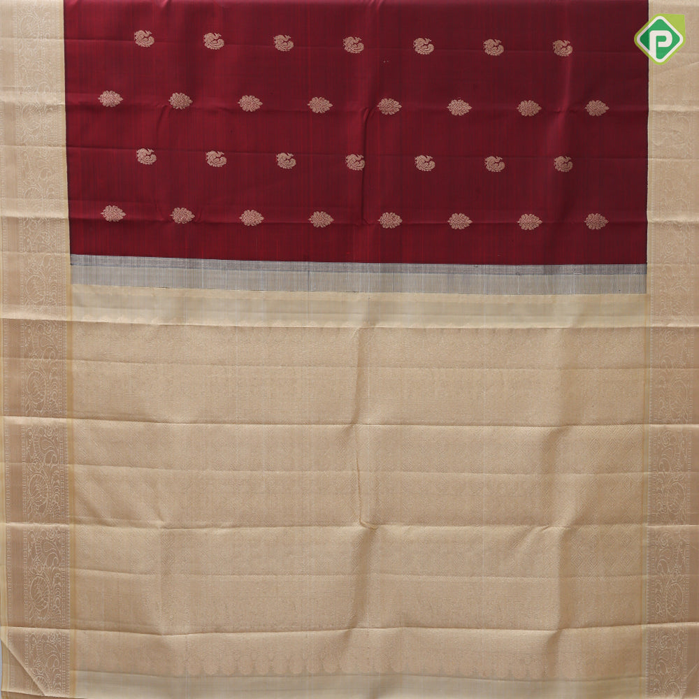 Maroon gold zari peacock fancy leaf butta design sandal gold zari rangoli design border traditional silk saree