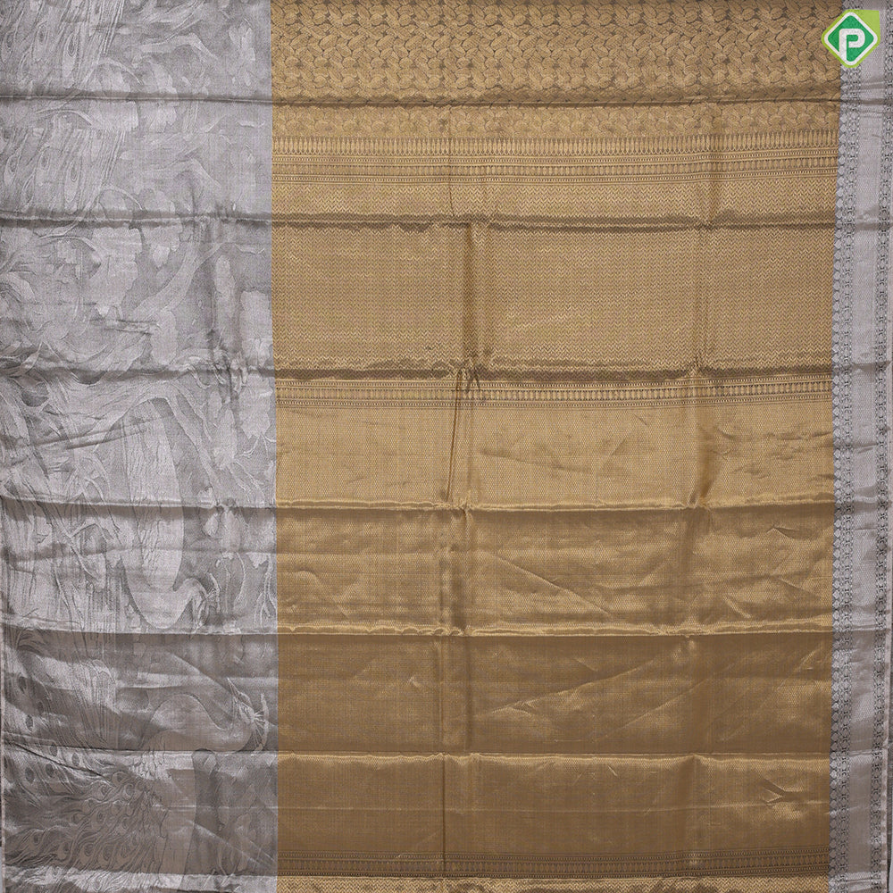 Golden yellow grand waves zari by zari weaved design Greyish self art effect scenery border trendy tissue silk saree