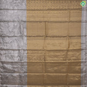 Golden yellow grand waves zari by zari weaved design Greyish self art effect scenery border trendy tissue silk saree