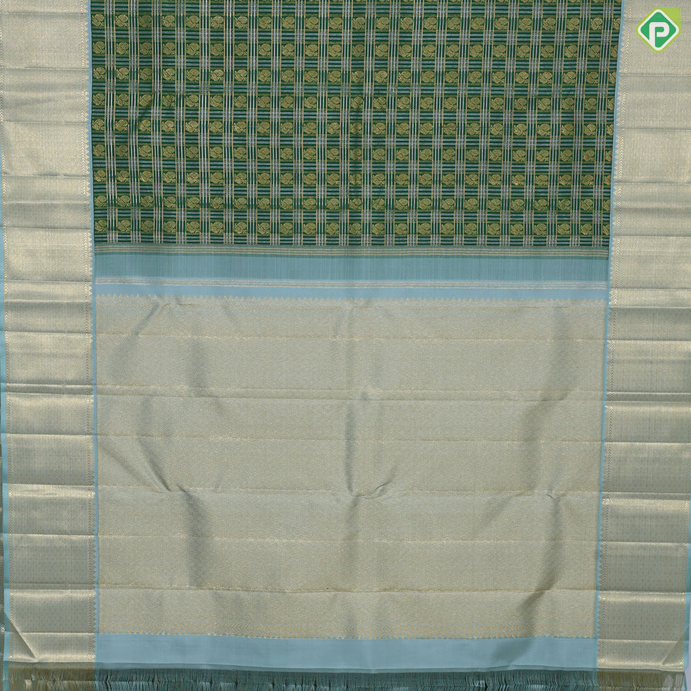 Dark green with peacock butta silver and gold zari checkered sea foam green border traditional silk saree