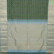 Dark green with peacock butta silver and gold zari checkered sea foam green border traditional silk saree