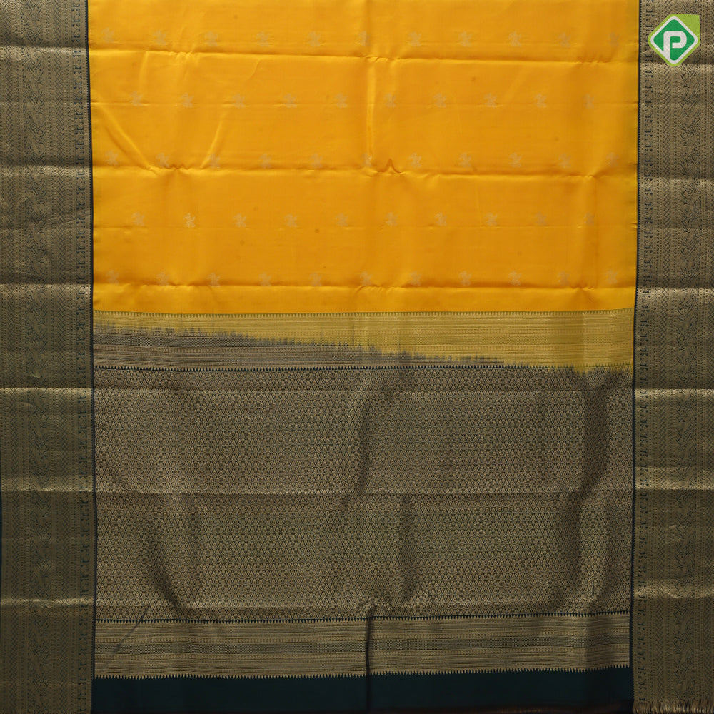 Mango yellow gold zari flying Kamdhenu butta olive green gold zari multi design line border traditional silk saree