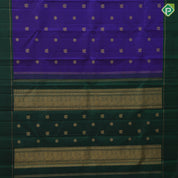 Indigo blue gold zari rudraksham annam butta motifs contrast green gold zari retta pett border traditional silk saree