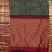 Dark green with gold zari grand floral design contrast maroon red gold zari border grand brocade bridal silk saree