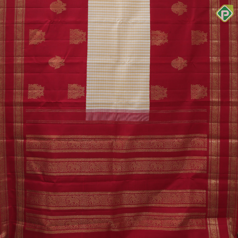 Cream with beige checks body design maroon gold zari butta high three part border concept vintage silk saree