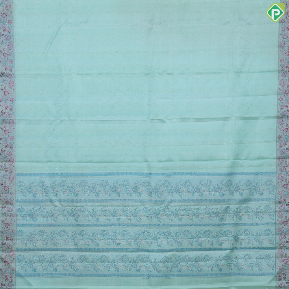 Suffire green silver zari zig zag waves design self multi color pythonic border grand bridal silk saree