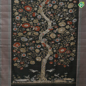 Dark emerald green molten golden zari birds grand tree florals diamond pattern borders landscape inspired signature silk saree