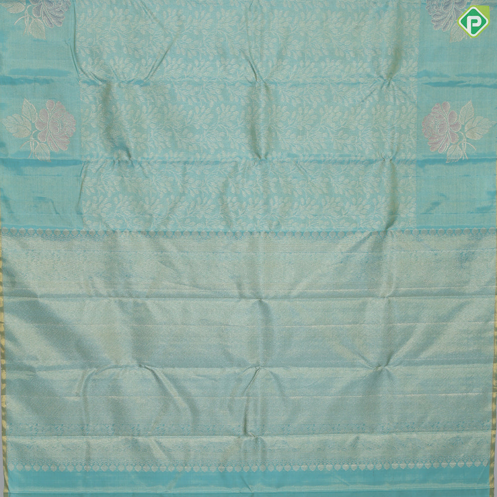 Sea green gold zari grand floral tissue weaved design self meena work floral border trendy tissue silk saree