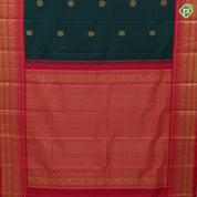Dark green gold zari chakkaram butta design rani red gold zari annam butta line border traditional retro silk saree