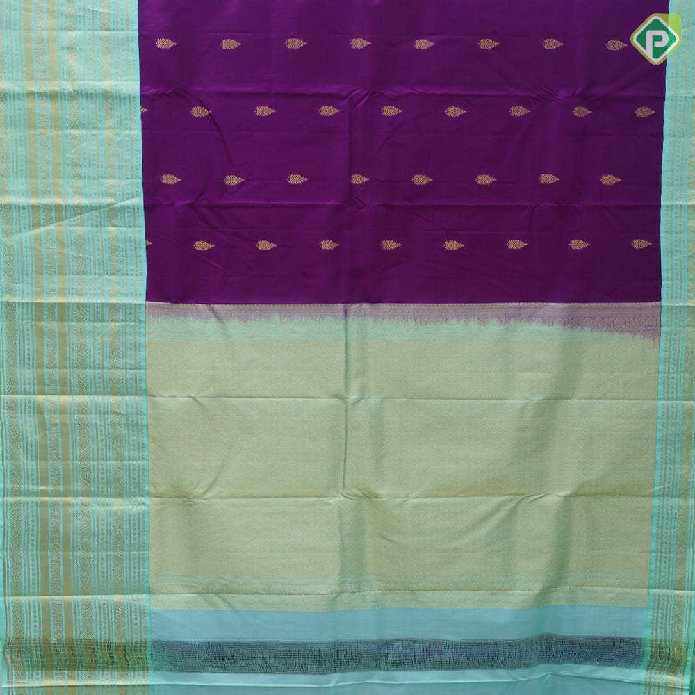 Purple gold zari leaf thilagam butta pista green gold zari multi designed lines border traditional silk saree