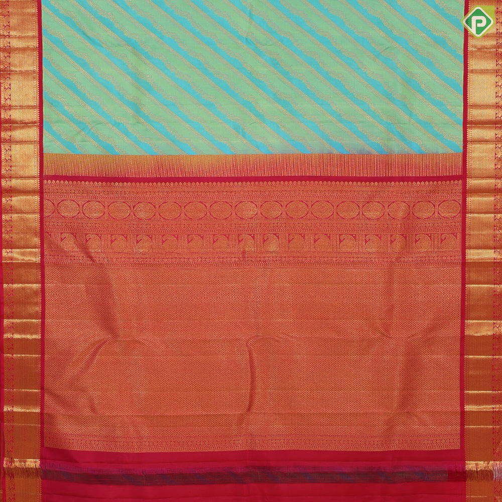 Pista green sky blue and gold zari cross lines design contrast pink gold zari border grand bridal silk saree