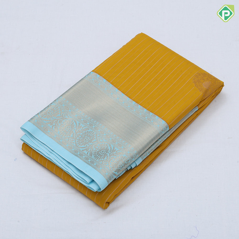Mustard yellow gold zari stripes big thilagam butta pista green gold zari rangoli design border art silk saree