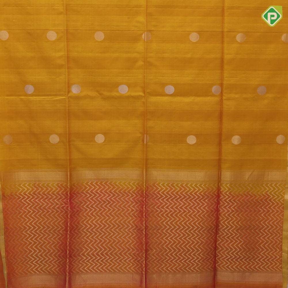 Emarald green silver gold zari round dots self gold zari border contrast orange pallu soft silk saree