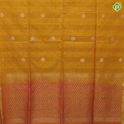 Emarald green silver gold zari round dots self gold zari border contrast orange pallu soft silk saree