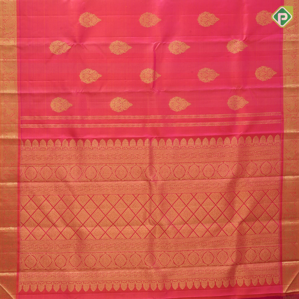 Bottle green gold zari fancy thilagam butta design self color gold zari peacock elephant butts edge border traditional silk saree