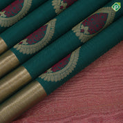 sapphire green gold zari thread meena work thilagam butta gold zari tissue bavanji border traditional Navratri special silk saree