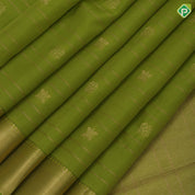 Parrot green gold zari lines and fancy butta self gold zari edge border pure mix silk saree