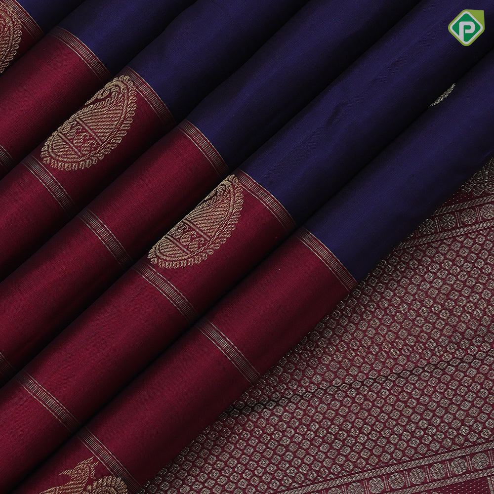 Royal blue gold zari chakkaram butta design maroon mango and peacock zari lines green edge border traditional silk saree