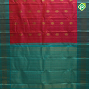 tomato red gold zari checked self design round butta contrast rexona green gold zari border traditional silk saree