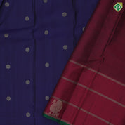 Royal blue gold zari chakkaram butta design maroon mango and peacock zari lines green edge border traditional silk saree